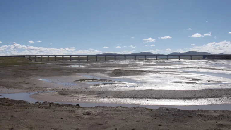 Dry riverbed beneath Tongtian River Bridge in Xinjiang, China