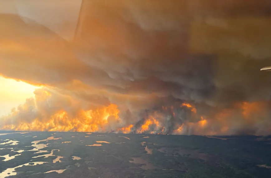 Smoke rises from wildfire WE024 which has prompted a pre-evacuation notice in Flin Flon, Manitoba, Canada May 27, 2025